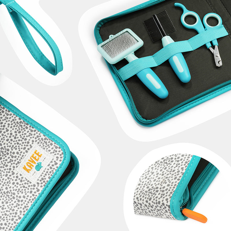 Gros plans sur la trousse de toilettage bleue et blanche a pois gris de la marque Kavee et ses accesssoires : un coupe-ongle, une brosse et un peigne.