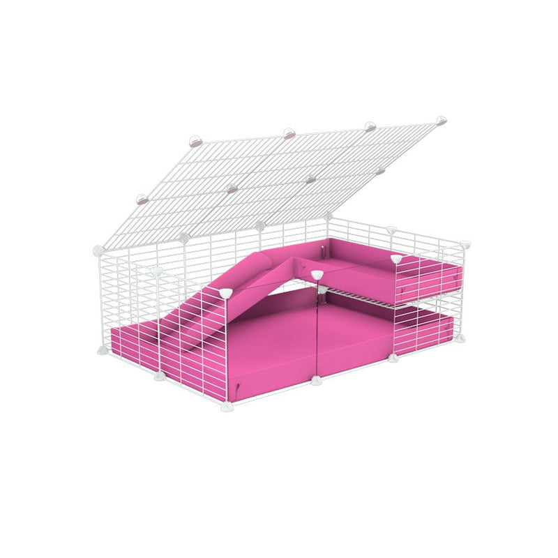 une cavy C&C cage 3x2 pour cochons d'inde avec panneaux transparents en plexiglass avec une rampe un loft un couvercle un coroplast rose et grilles blanches fines
