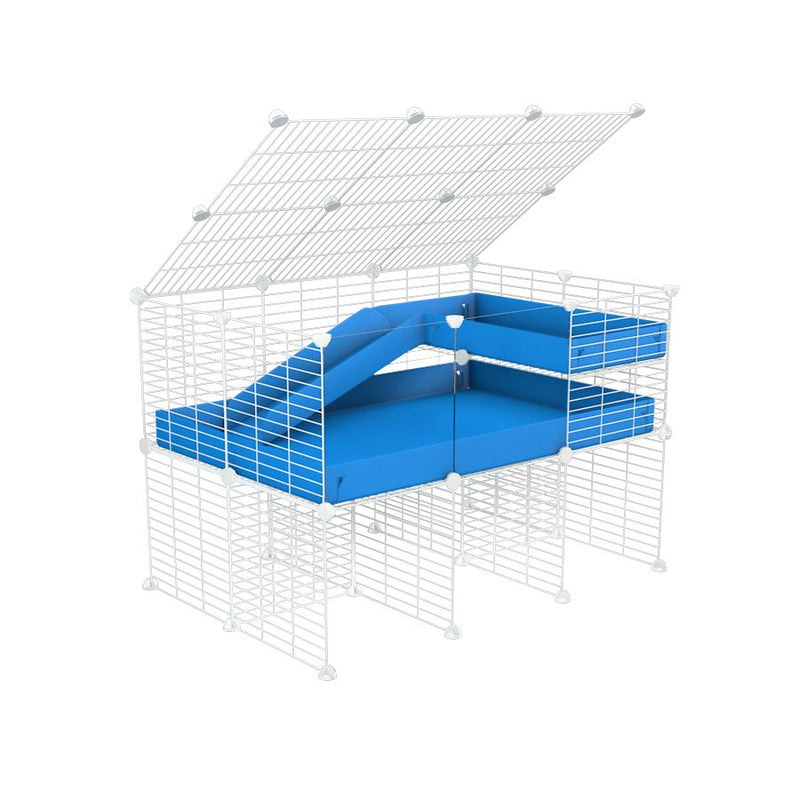 une kavee cage 3x2 avec panneaux transparents en plexiglass  pour cochons d'inde avec rehausseur couvercle loft rampe coroplast bleu et grilles blanches fines