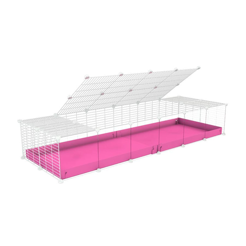 une cavy cage 6x2 avec panneaux transparents en plexiglass  pour cochons d'inde avec couvercle coroplast rose et grilles blanches avec barreaux etroits de kavee