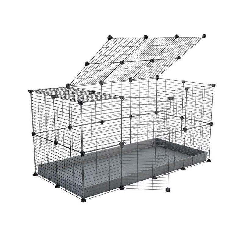 Une cavy cage 4x2 modulaire pour lapins avec un couvercle un coroplast gris et des grilles a maillage fin par kavee