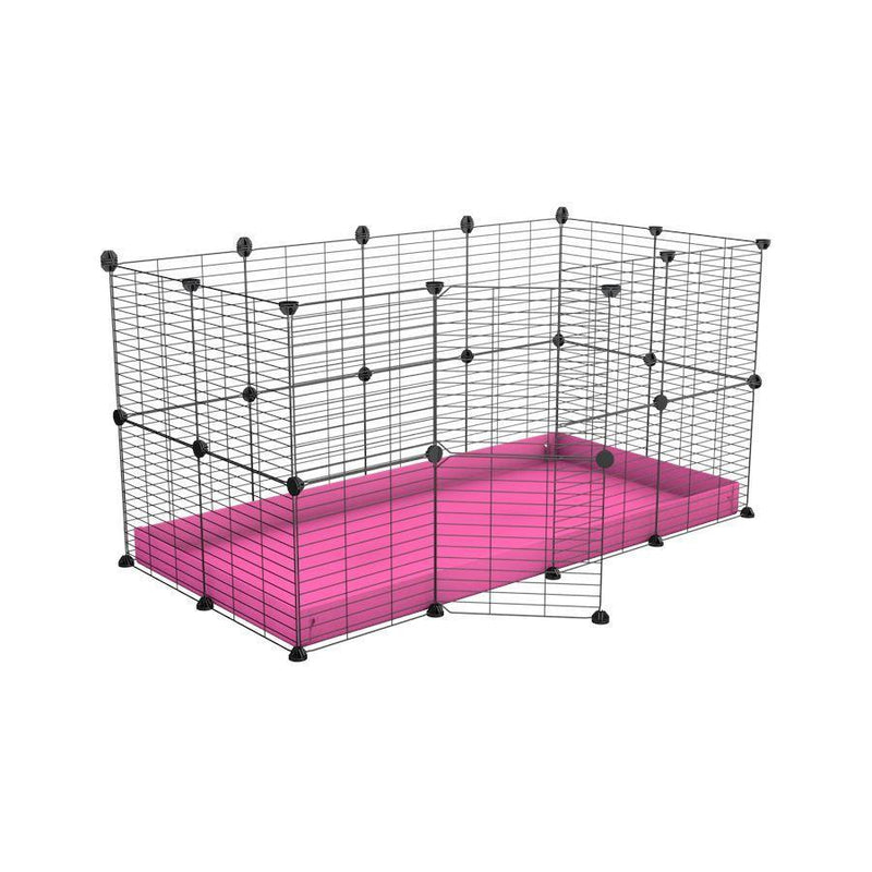 Une kavee cage modulaire 4x2 pour lapins avec un coroplast rose et des grilles a barreaux etroits